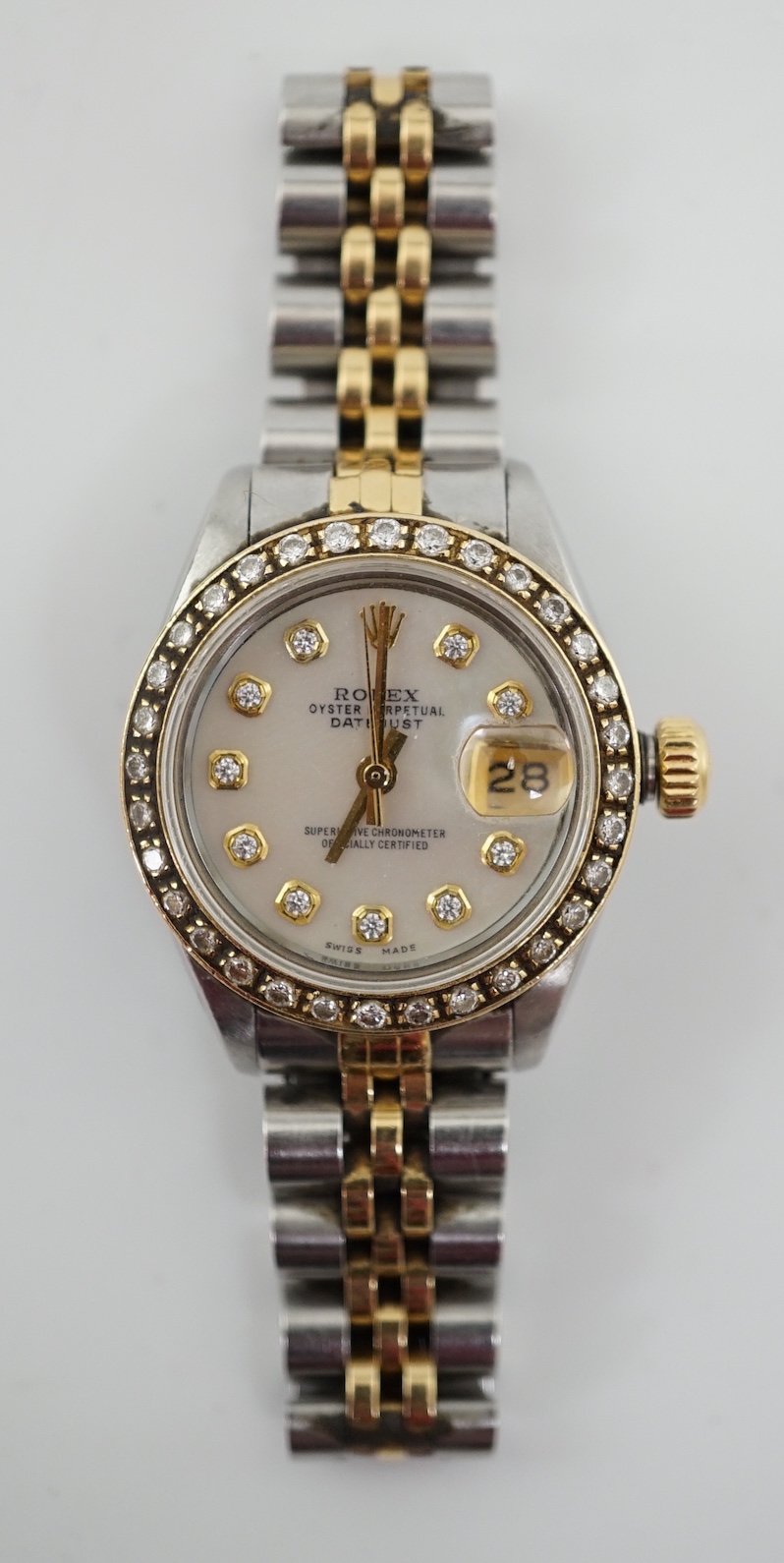 A lady's 1980's stainless steel and gold Rolex Oyster Perpetual Datejust wrist watch, with mother of pearl dial and diamond dot markers and bezel